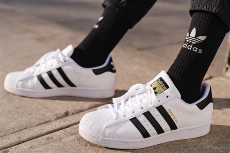 classic adidas shell toe shoes.